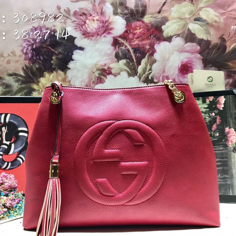 G*u*i shopping bags